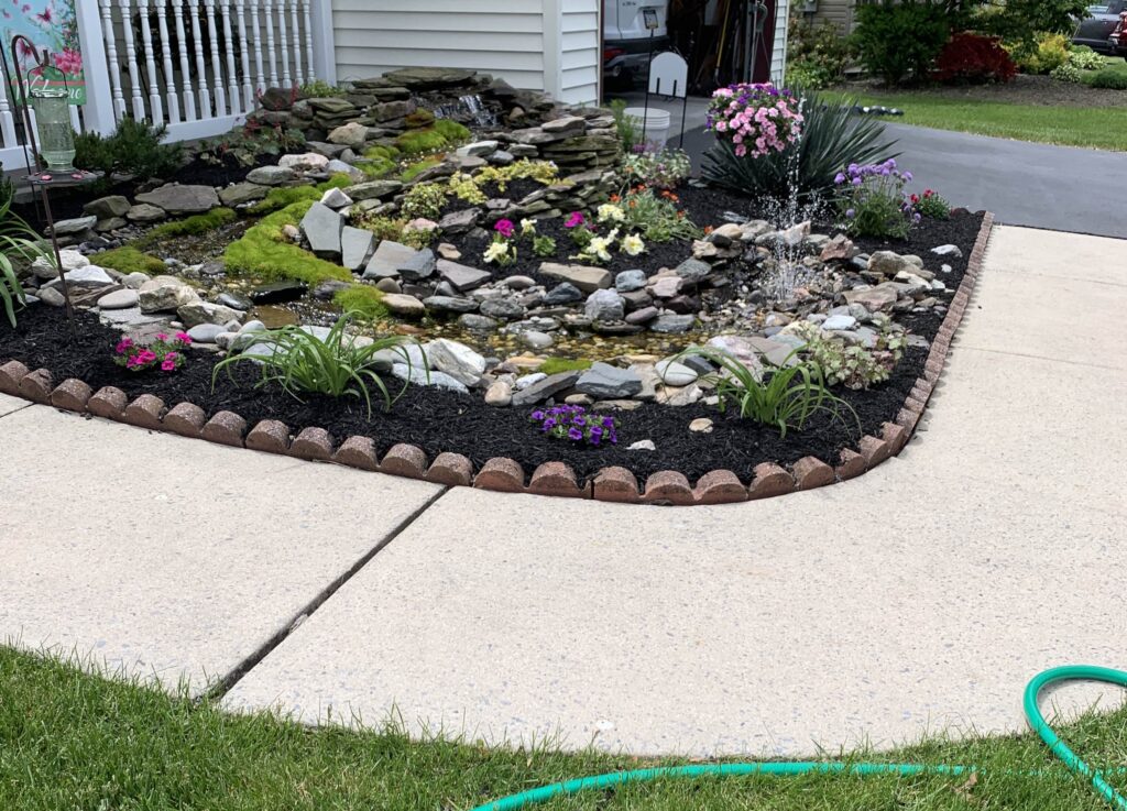 Beautiful stone patio designed and installed by Horizon Outdoors LLC in Annville, PA