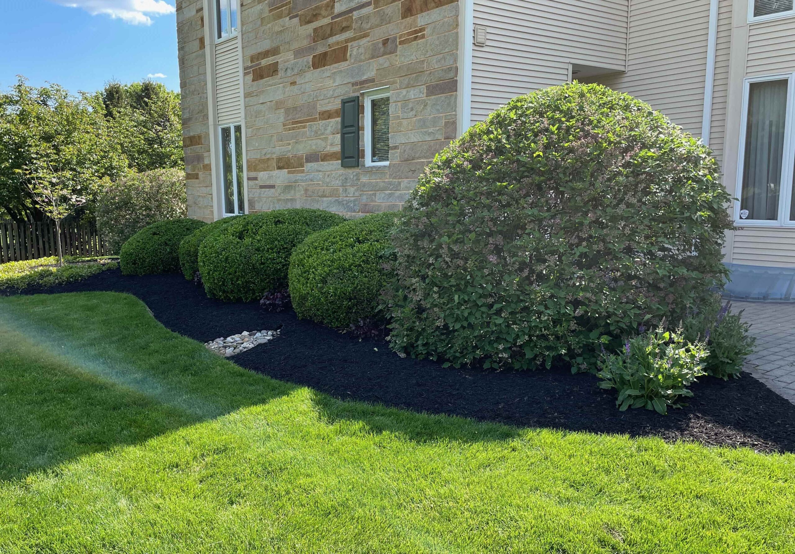 Custom-designed patio with elegant stonework in Hershey, PA